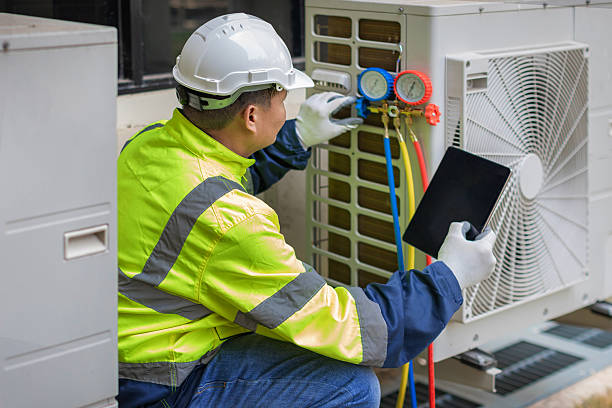 Professional Air Duct Cleaning technician working in New Orleans, LA